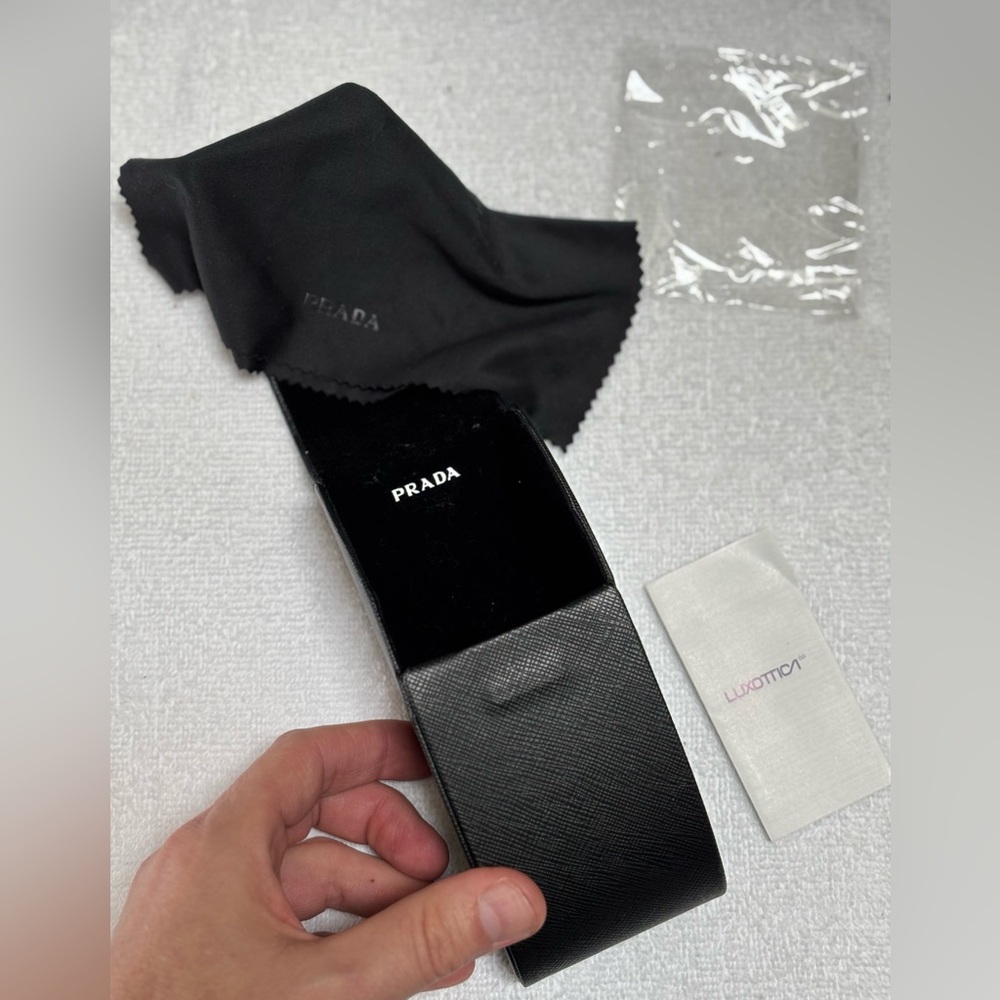 Prada sunglass case with Prada micro fiber cleaning clothing